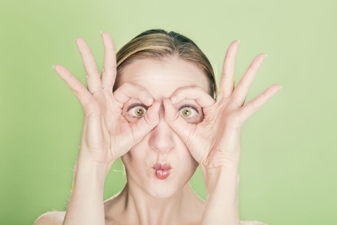girl with hand specs
